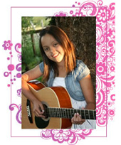 Josie Armstrong playing an acoustic guitar